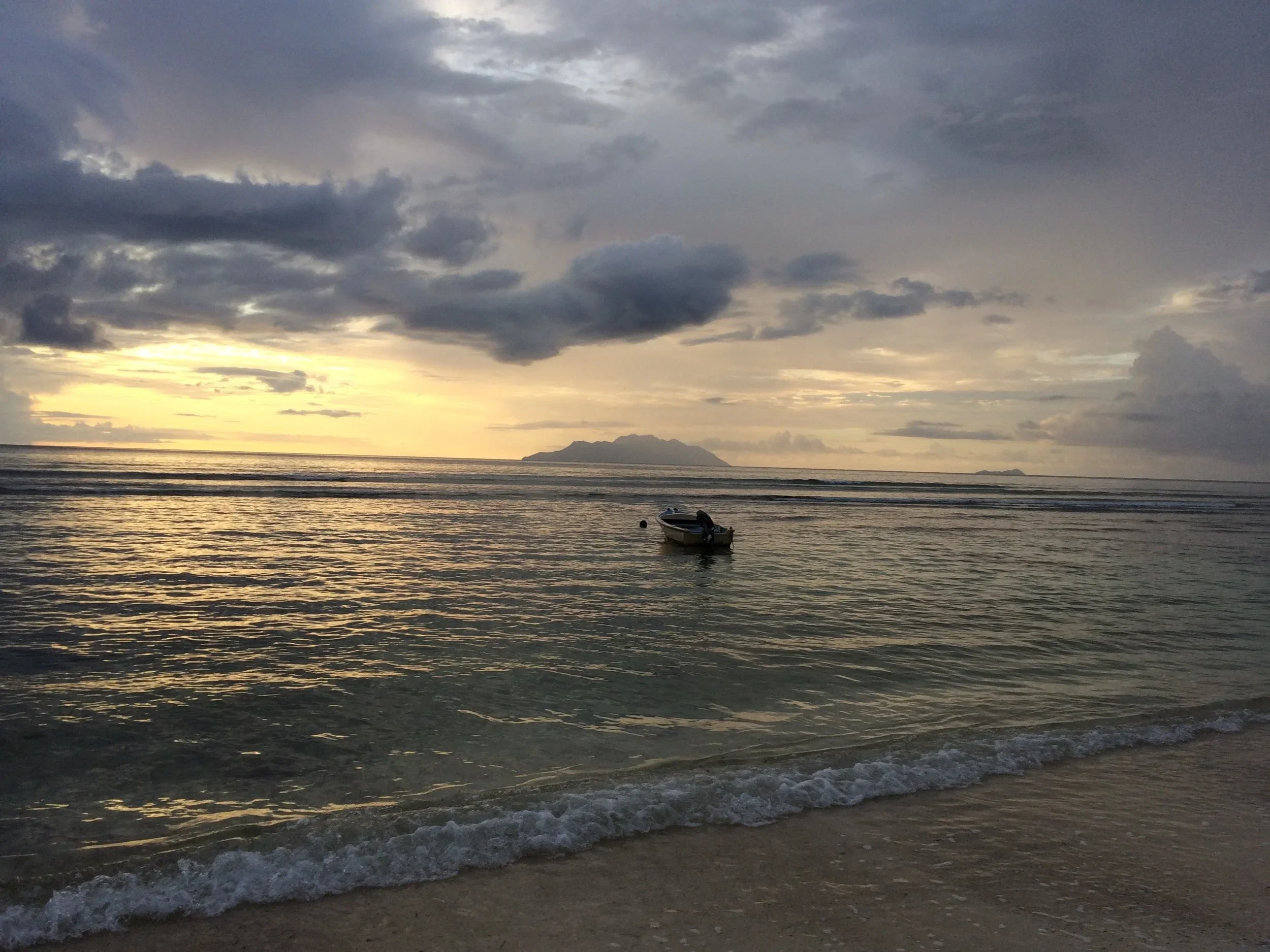 Sunset over a calm tropical sea