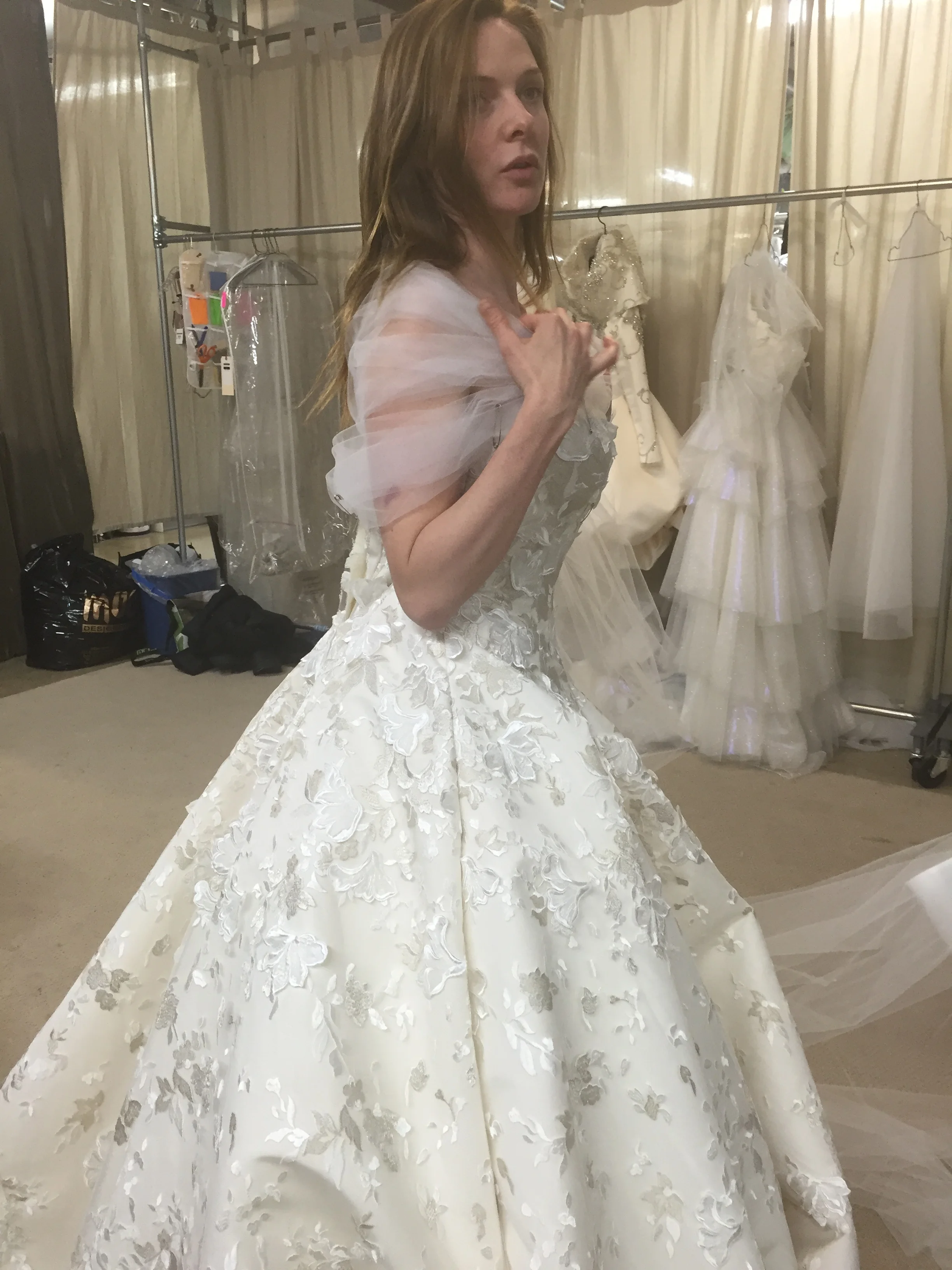  We were trying different options for the shoulder band, that would give the final touch to the dress.&nbsp; 