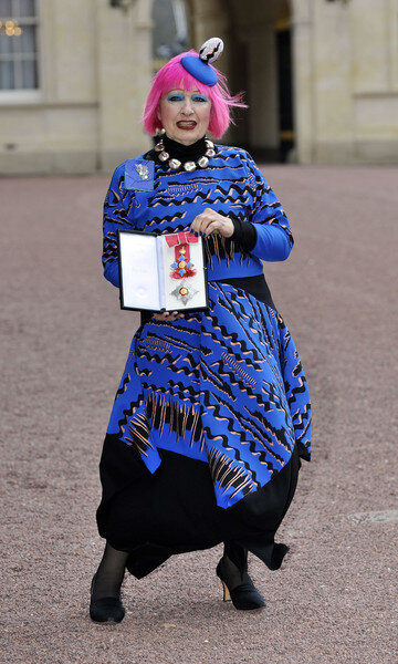  Rhodes was made a Dame at a ceremony in Buckingham Palace 