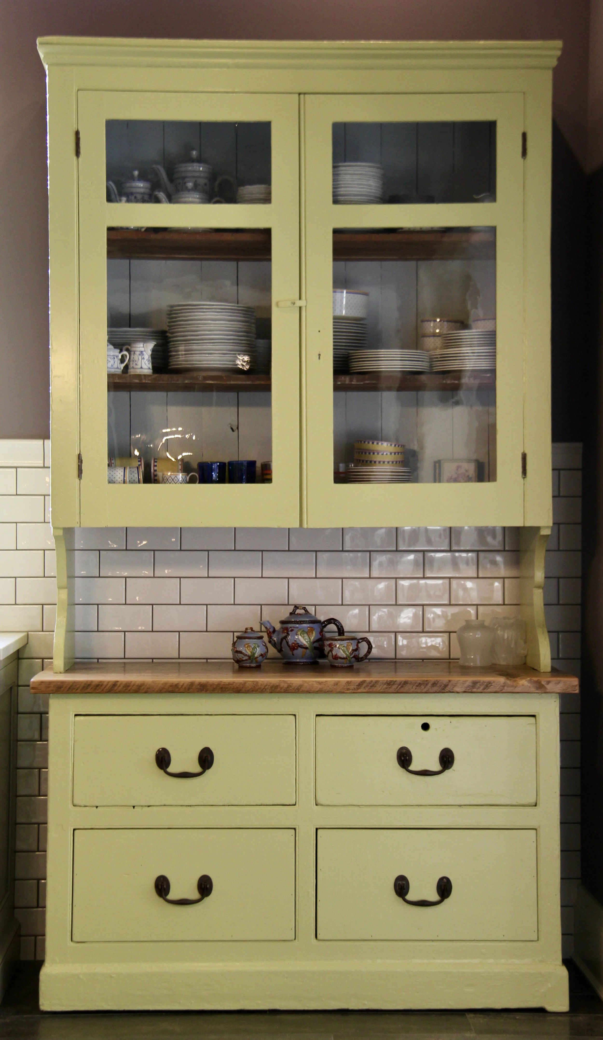 For this antique hutch, we refinished inside and out with colors of the client’s choosing. The countertop is remade with reclaimed hemlock barn wood.