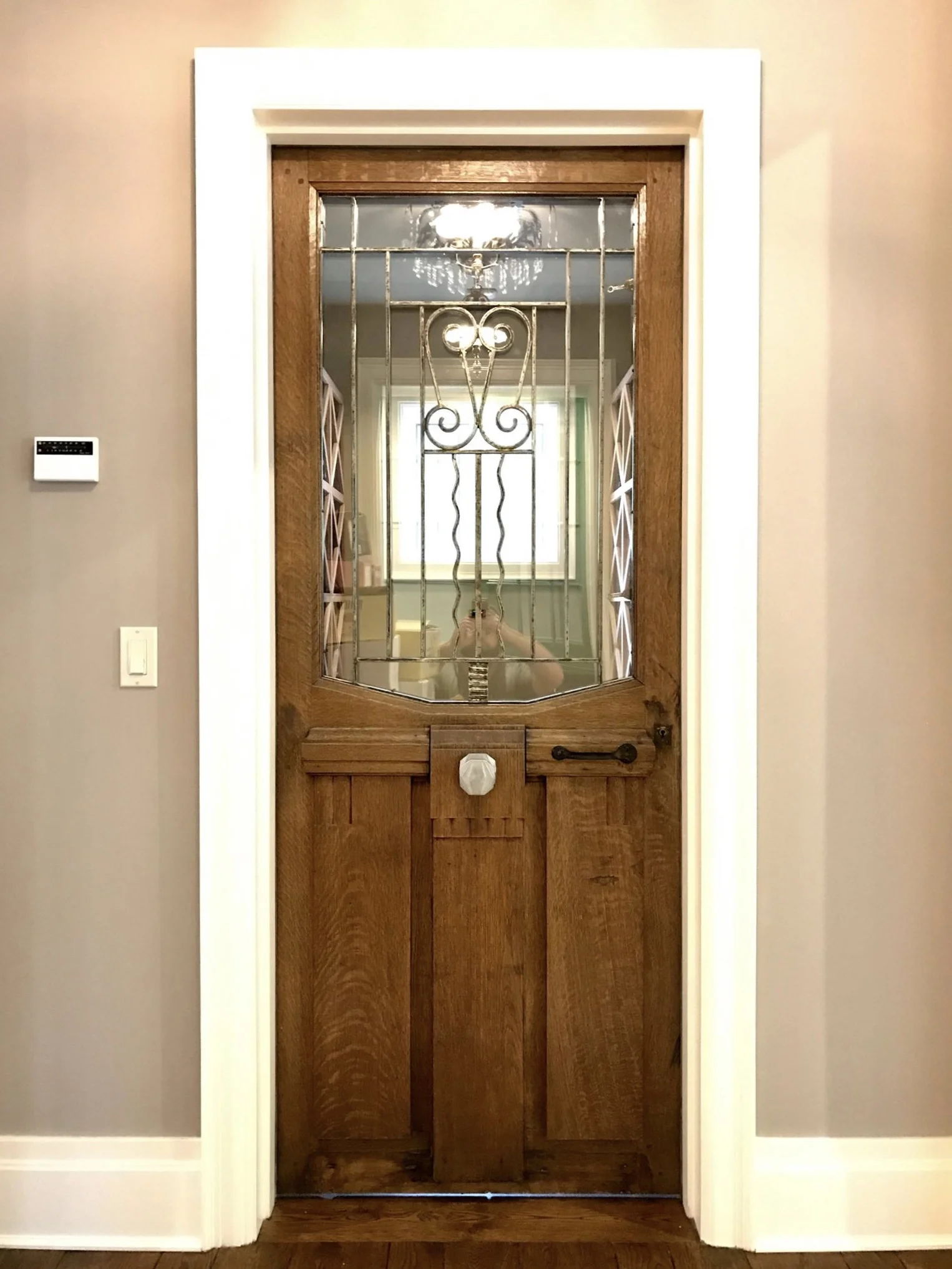 This antique oak door was almost thrown into a dumpster. We completely refinished it and made it weather-tight for a wine cellar.