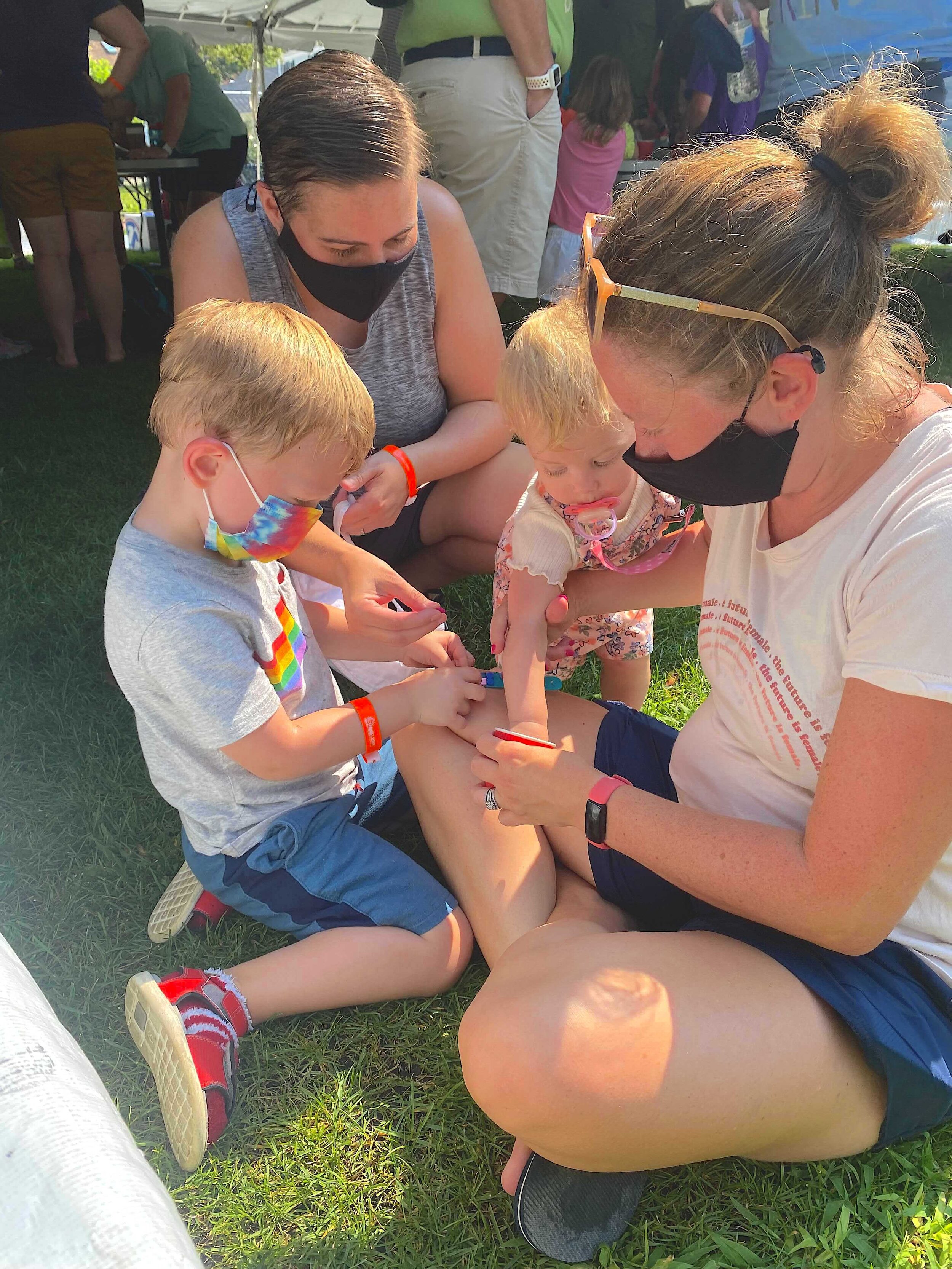 Family enjoys the daily Littles Gathering in Bas Relief Park