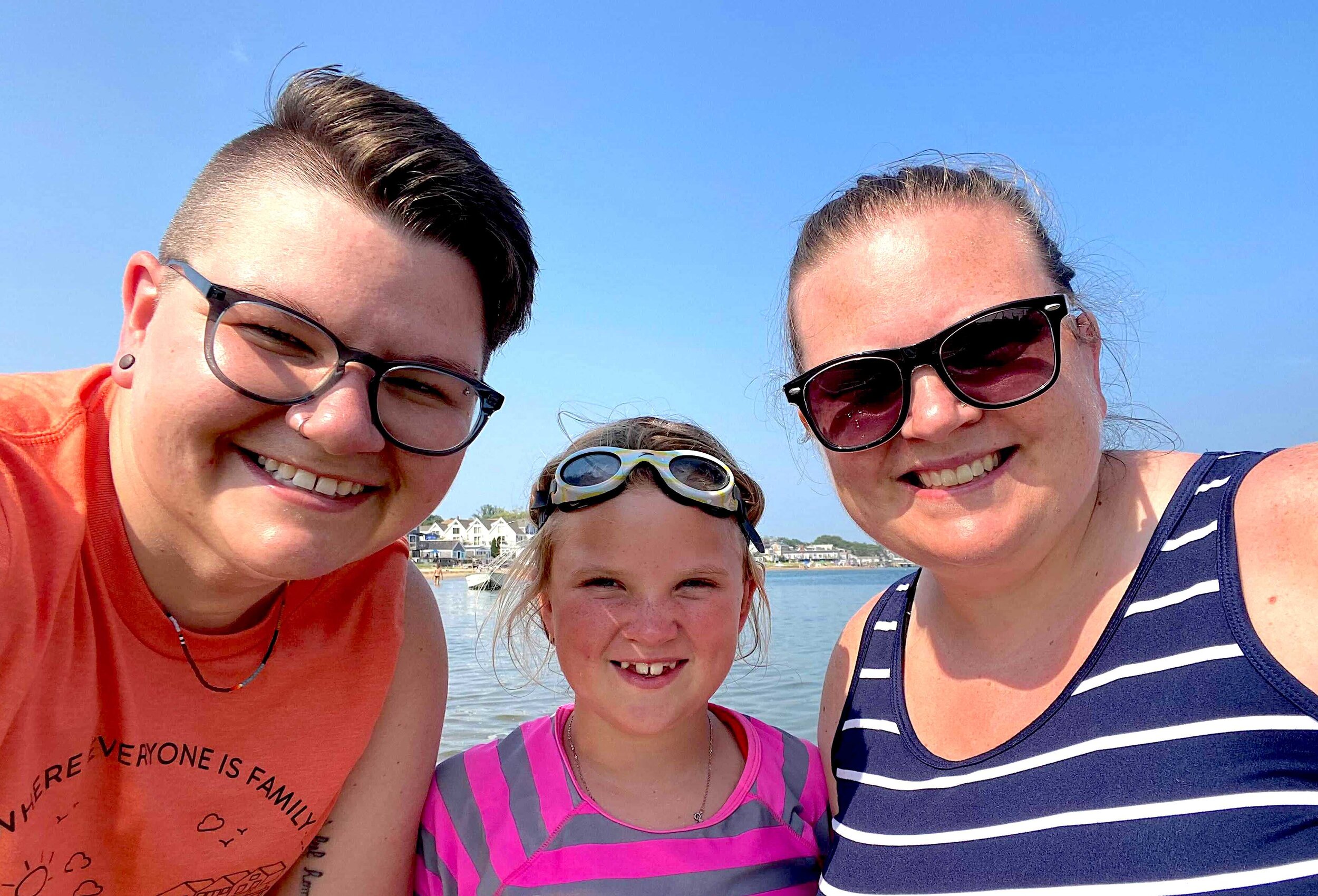 Family enjoys the Moms Gathering on the beach by MacMillan Pier