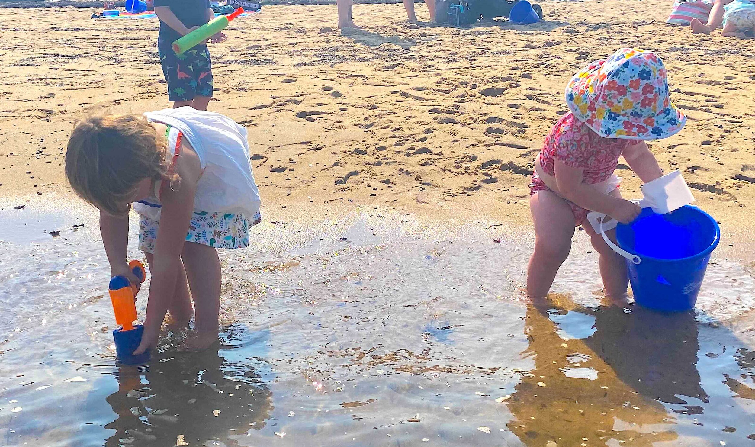 Family enjoys the Moms Gathering on the beach by MacMillan Pier