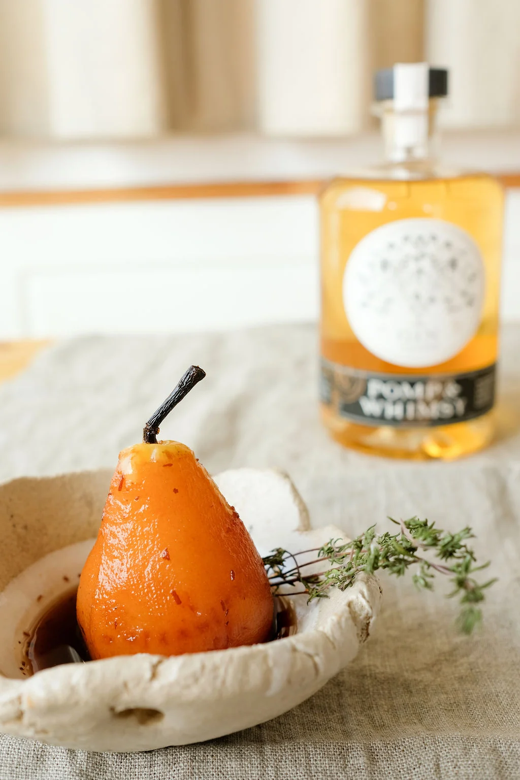 POMP & WHIMSY GIN LIQUER Pomp & Whimsy, bringing modern sensibilities to the tradition of gin making, by infusing classically distilled gin with a natural, delightfully flavorful botanical liqueur. The result is a highly refined, yet playfully sensorial spirit, that is both graceful by itself, and effortlessly dressed, up or down. Photo by Bessie Lacap, Torn Bowl available through Piece of Clay