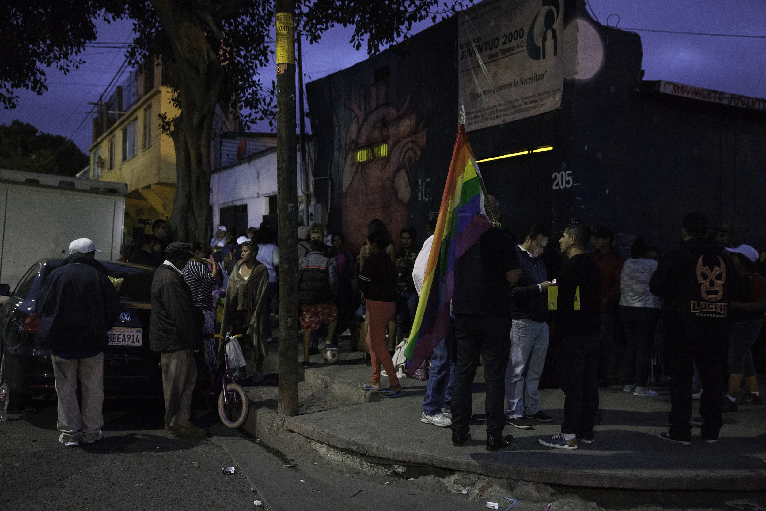 A small group of LGBTQ supporters showed up before the 4th bus arrived to show solidarity. After the bus arrived people stood outside of Juventud 2000 shelter in Tijuana, MX, on April 26, 2018.