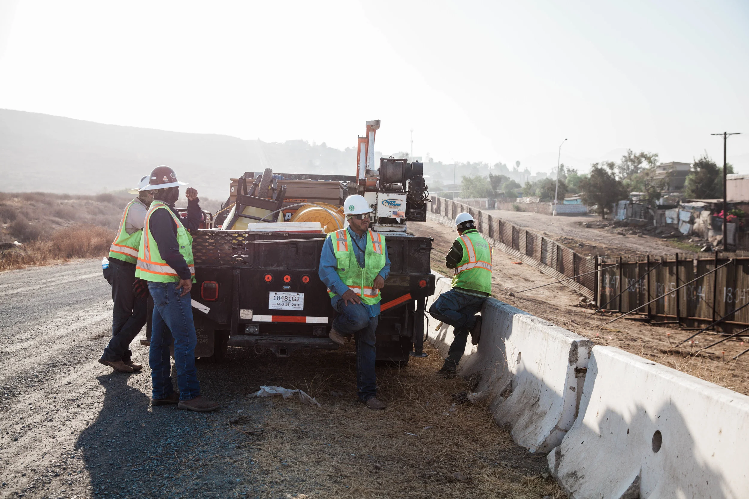The workers were taking a break in Otay Mesa near the border fence on the U.S side. They are there to upgrade a section of the wall. Other workers have other sections of the wall.