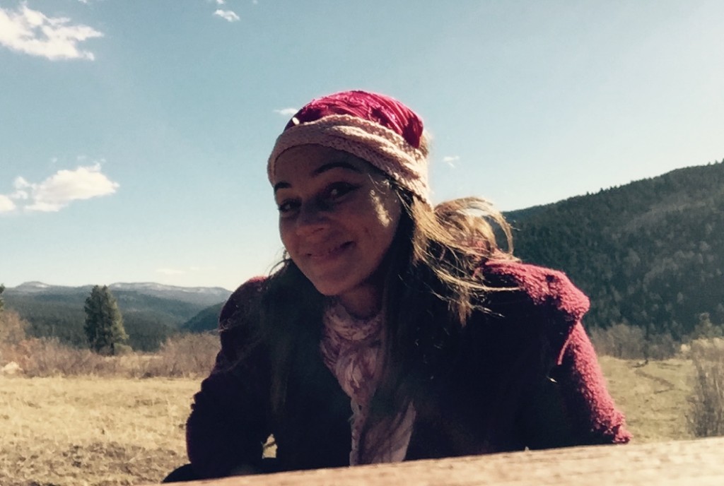 Happy woman from New Mexico hoping to adopt a child