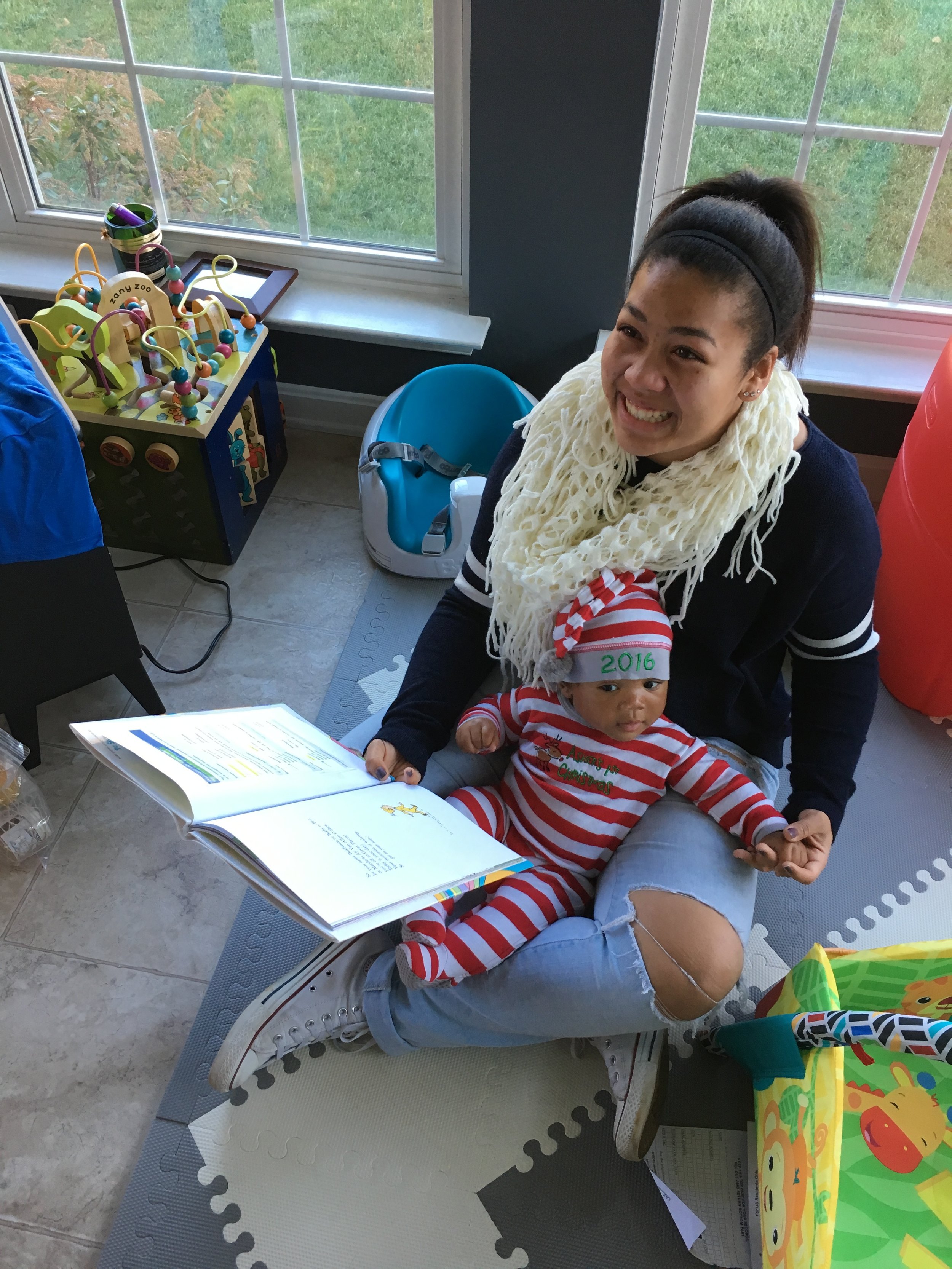 Surprise- surprised Aleks at Christmas to an amazing trip to Seattle, WA to see her favorite soccer team. She always has her brother in her lap!