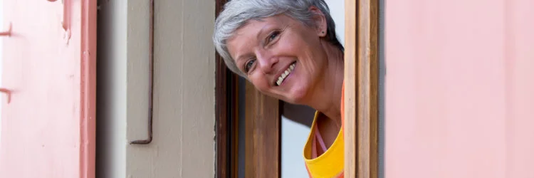 Happy grey-haired woman