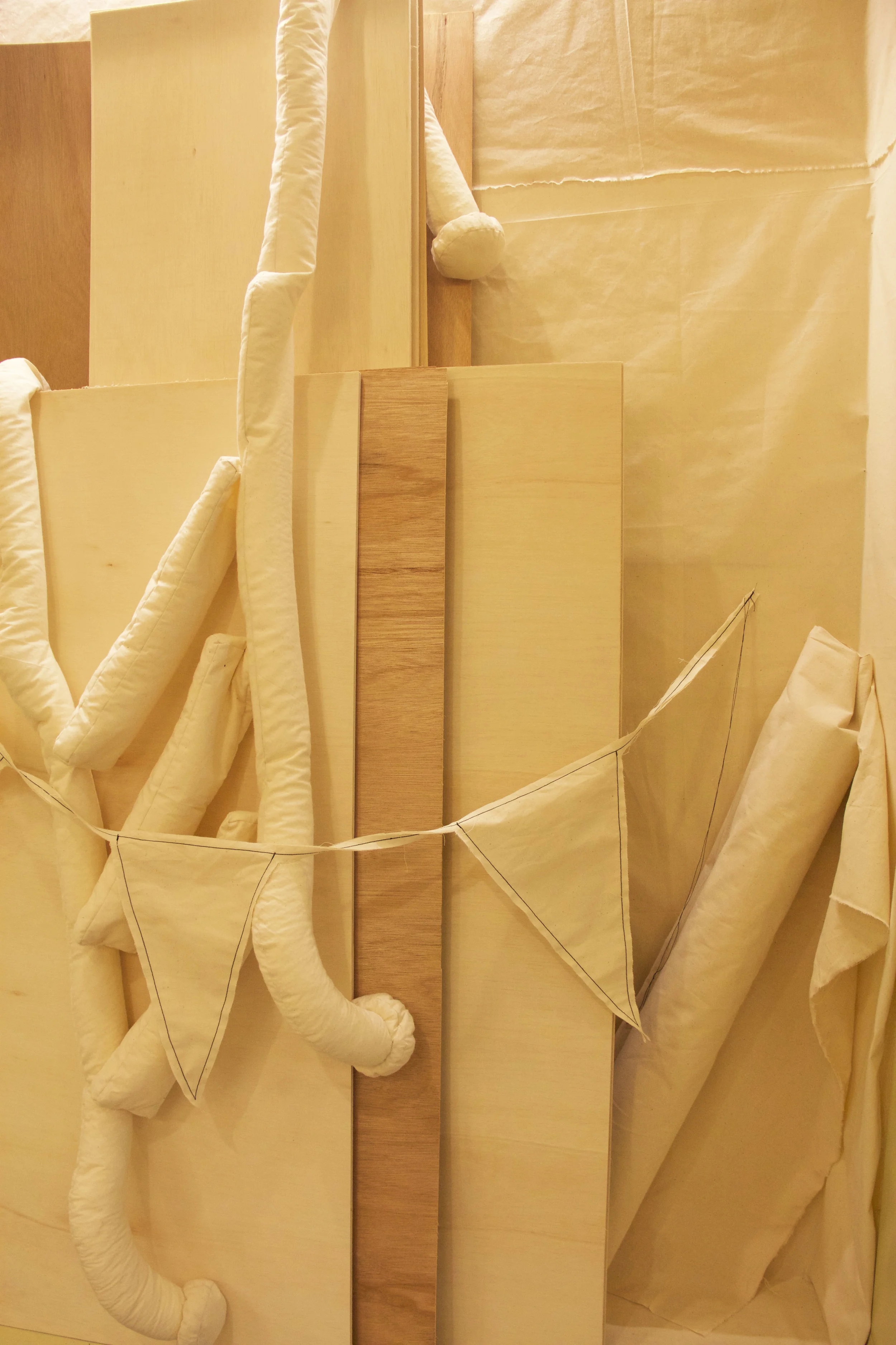 Understudy , calico fabric, hobbyfill stuffing, thread, plywood. dimensions variable.