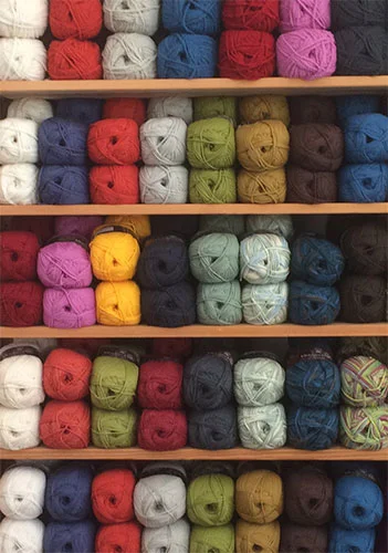 A selection of the White Gum wool yarn range at the Uralla Wool Room — the colour range is impressive!