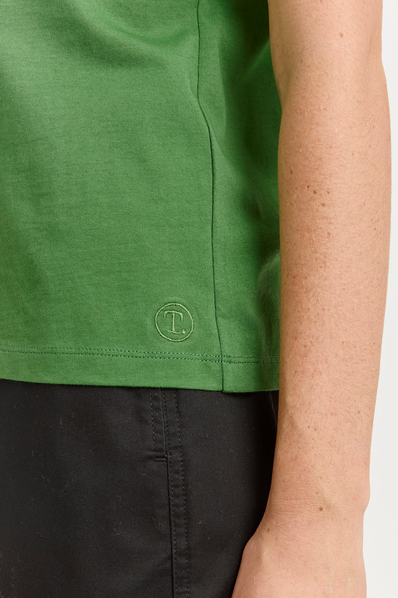 Closeup pic of the Spring (green) colour variant of the organic cotton tee from Toorallie