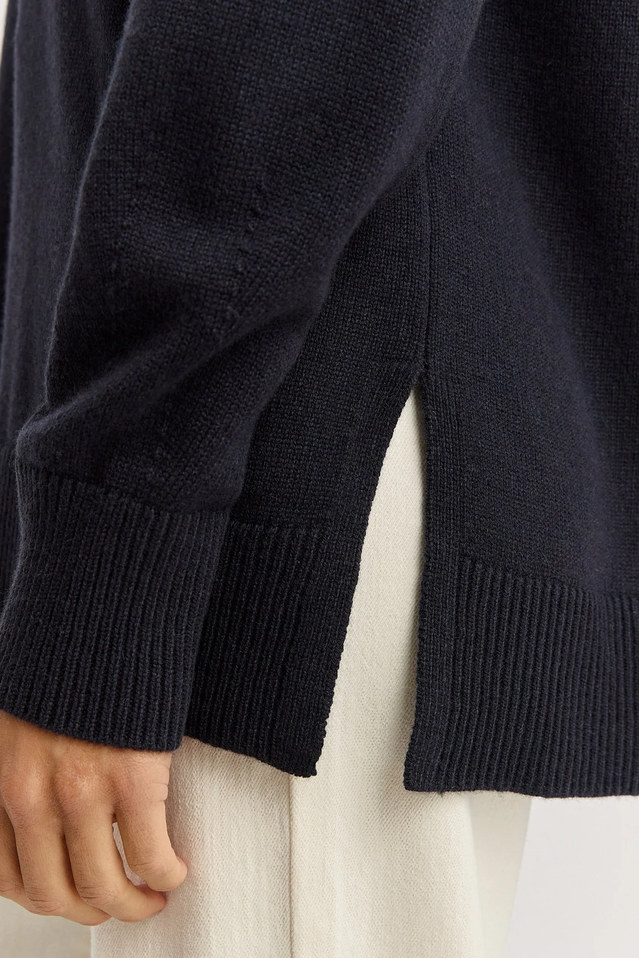 Closeup of the French Navy colour variant of the Toorallie Relaxed Longline Crew Sweater made from 100% Merino lambswool