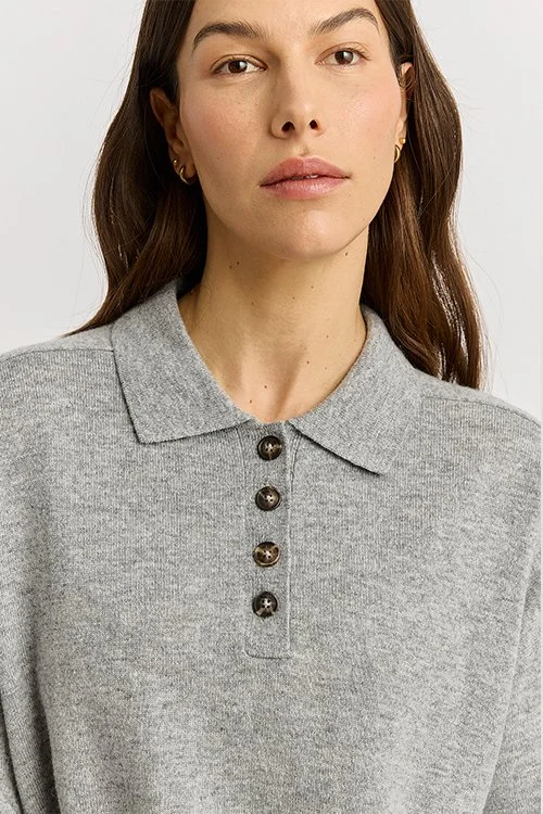 Closeup of the buttons on the light ash grey variant of the Fine Jersey Polo Pullover from Toorallie