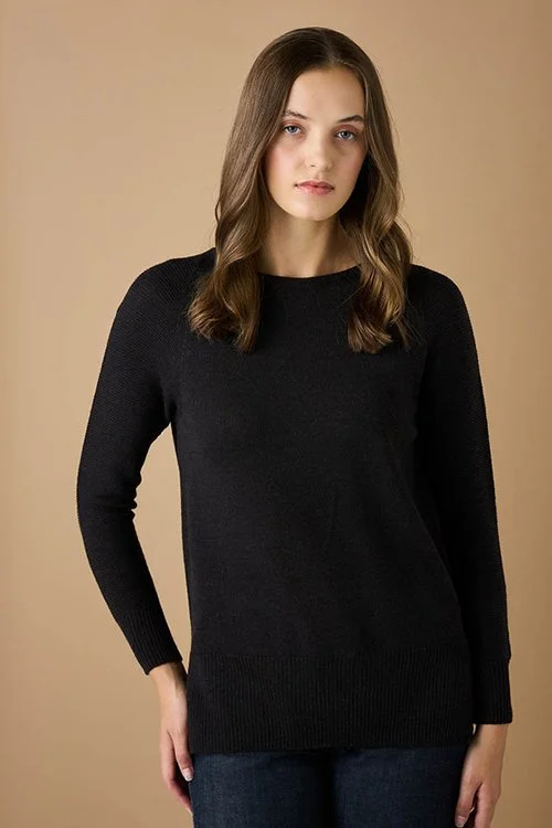 Licorice (black) colour variant of the uimi knitwear Etta Top made from Merino Wool