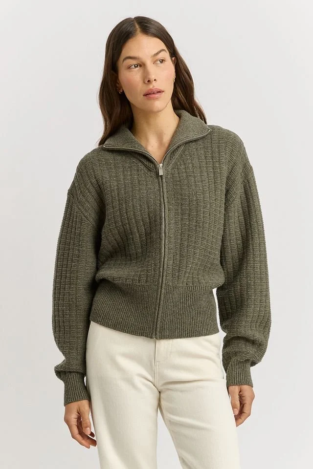 Woman wearing the Toorallie Grid Knit Zip Jacket, kale colour variant.