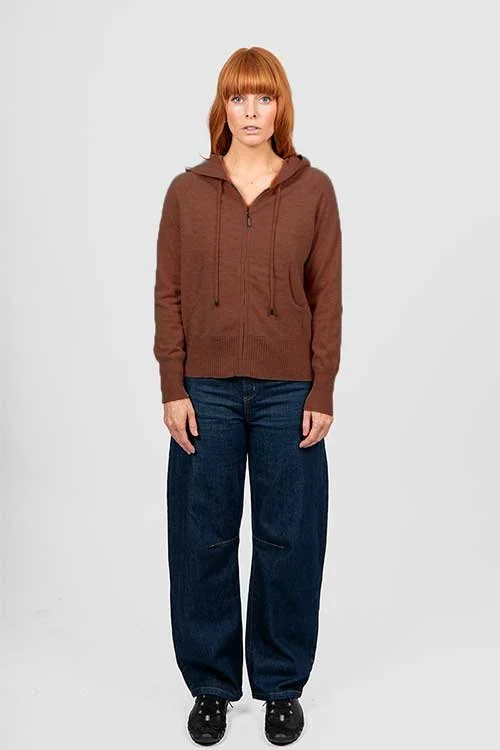 Woman wearing the Cognac (rich brown) colour variant of the Hayley Hoodie.