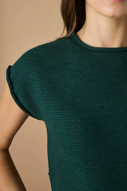 closeup of stitching of the Hunter (green) colour variant of the uimi knitwear Etta Vest made from Merino Wool