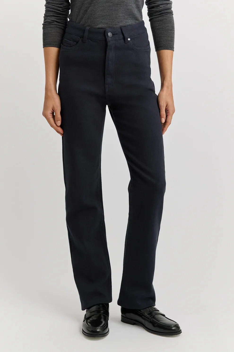 Closeup of the navy blue colour variant of Torallie wool denim jeans