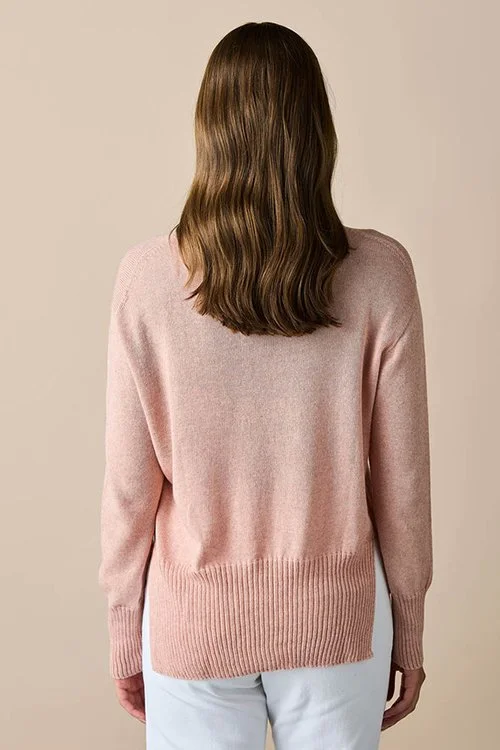 Back view of the Sienna (dusky pink) colour variant in the uimi knitwear Edith Jumper made from Egyptian Cotton + cashmere