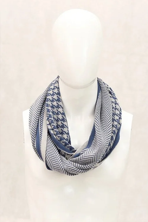 Blue and white colour variant of the Bone and Tooth Loop Scarf from DLUX knitted from 100% cotton.