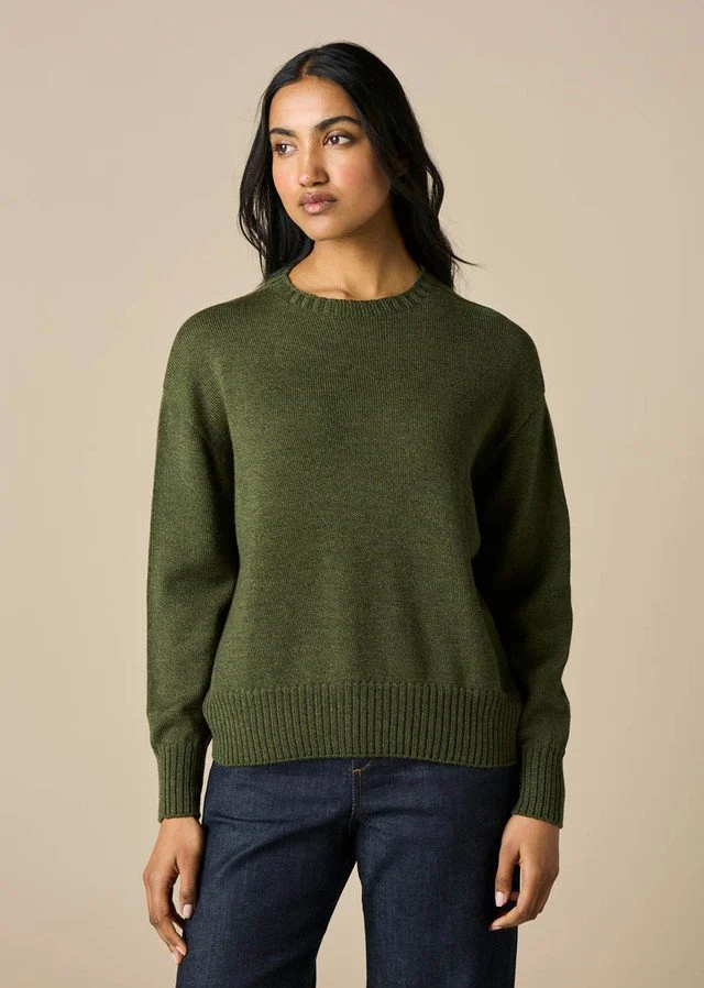 woman wearing the Moss Green colour of the Matilda Jumper from uimi knitwear.