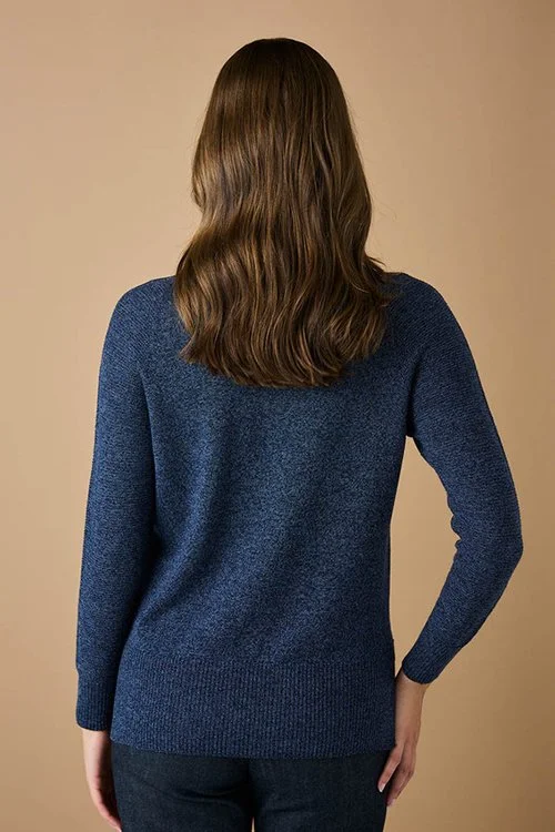 Back view of the Denim (blue) colour variant of the uimi knitwear Etta Top made from Merino Wool