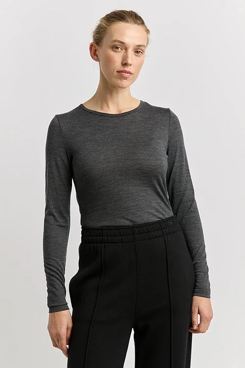 Woman wearing the Toorallie — Merino Wool Crew Tee - Charcoal Grey colour variant