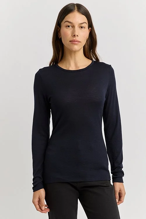 Woman wearing the Toorallie — Merino Wool Crew Tee - French Navy colour variant