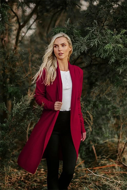 Cassis (deep crimson) colour variant next to a woman wearing the Bridge and Lord Emily longline cardigan.
