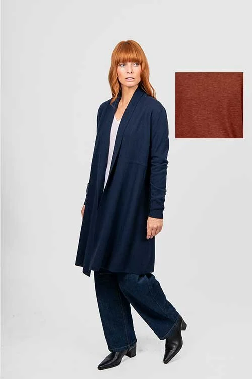 Swatch of the Cognac (rich brown) colour variant next to a woman wearing the Bridge and Lord Emily longline cardigan.