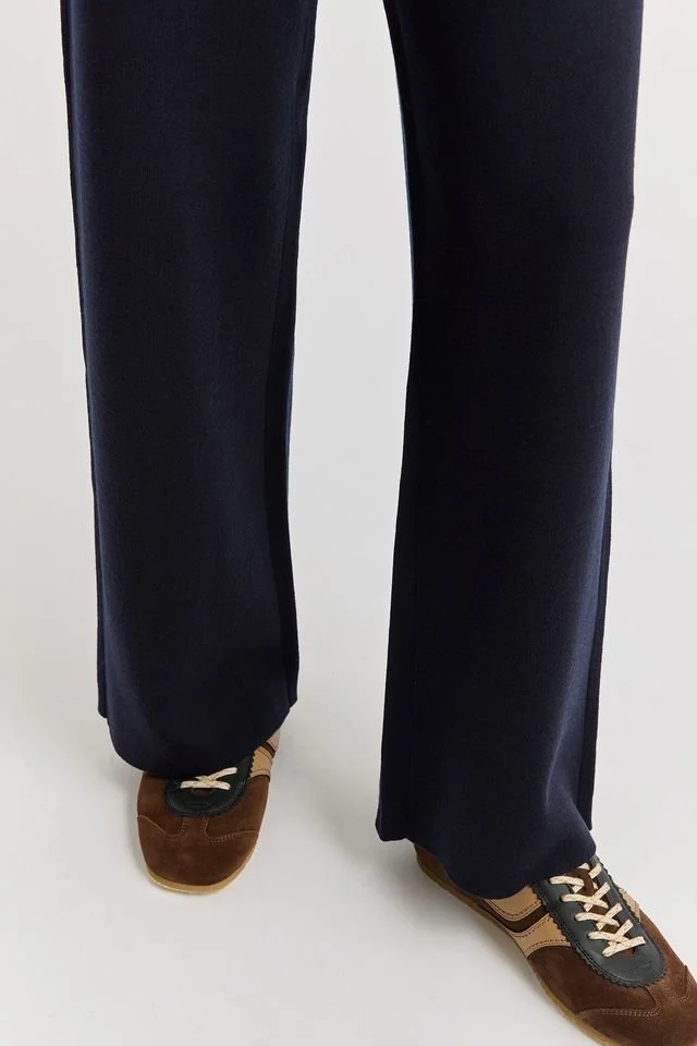 Closeup of black variant of the Toorallie Knit Pant made from Australian Merino wool.