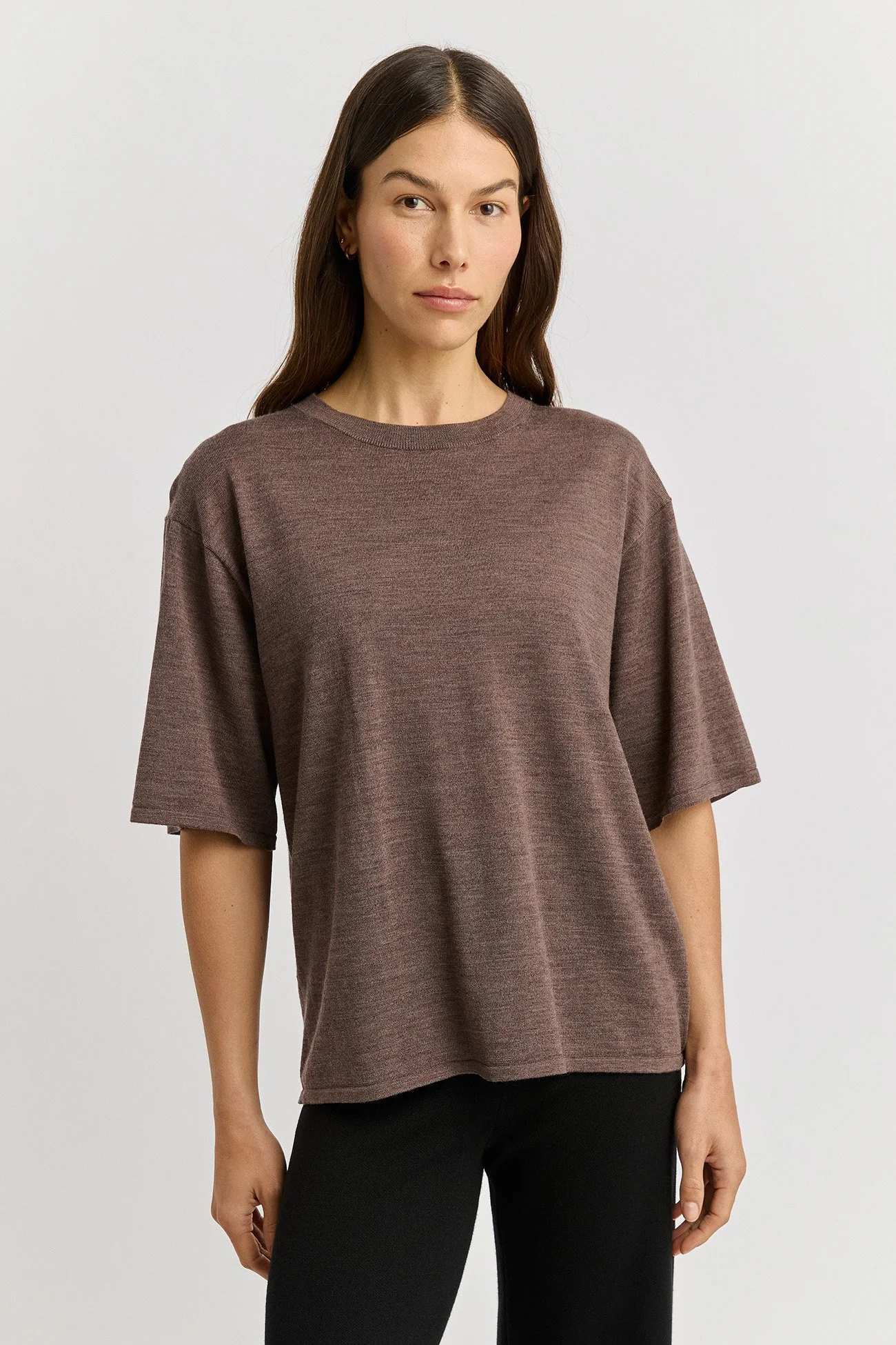 Woman wearing the mocha colour variant of the Extra Fine Relaxed Knit Tee Tee made from 100% Merino Wool by Toorallie