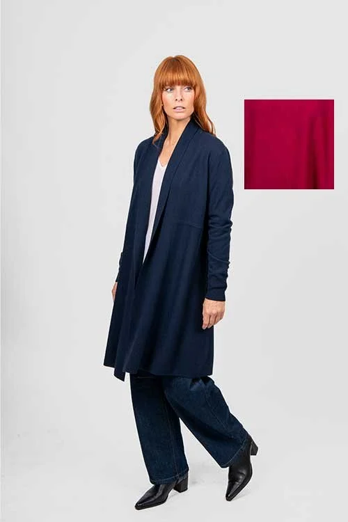 Swatch of the Cassis (deep crimson) colour variant next to a woman wearing the Bridge and Lord Emily longline cardigan.