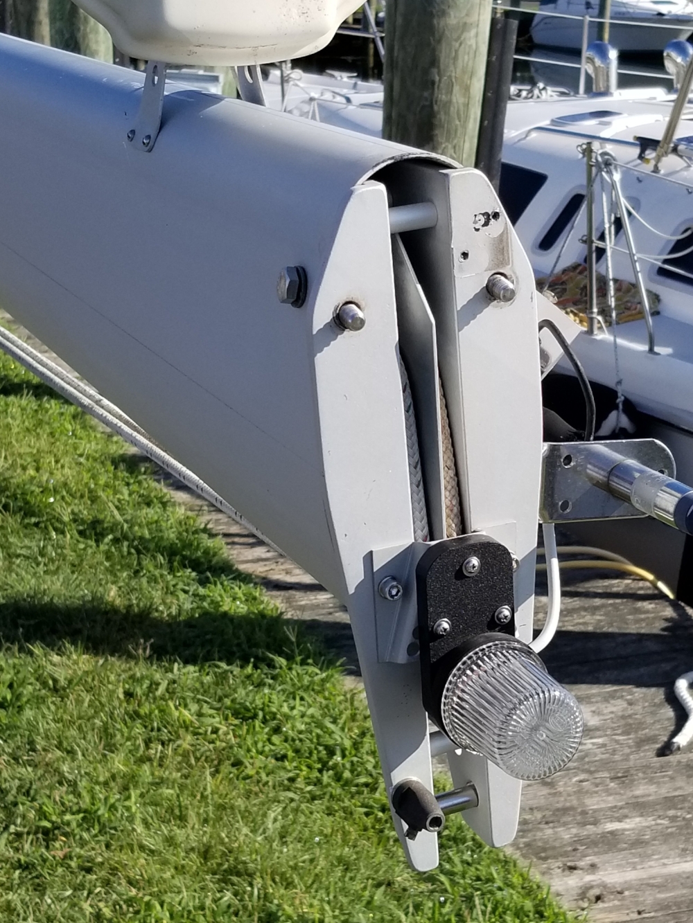 The wind instrument and Windex have been removed, as have the nuts for the J-hooks that hold the masthead in place.