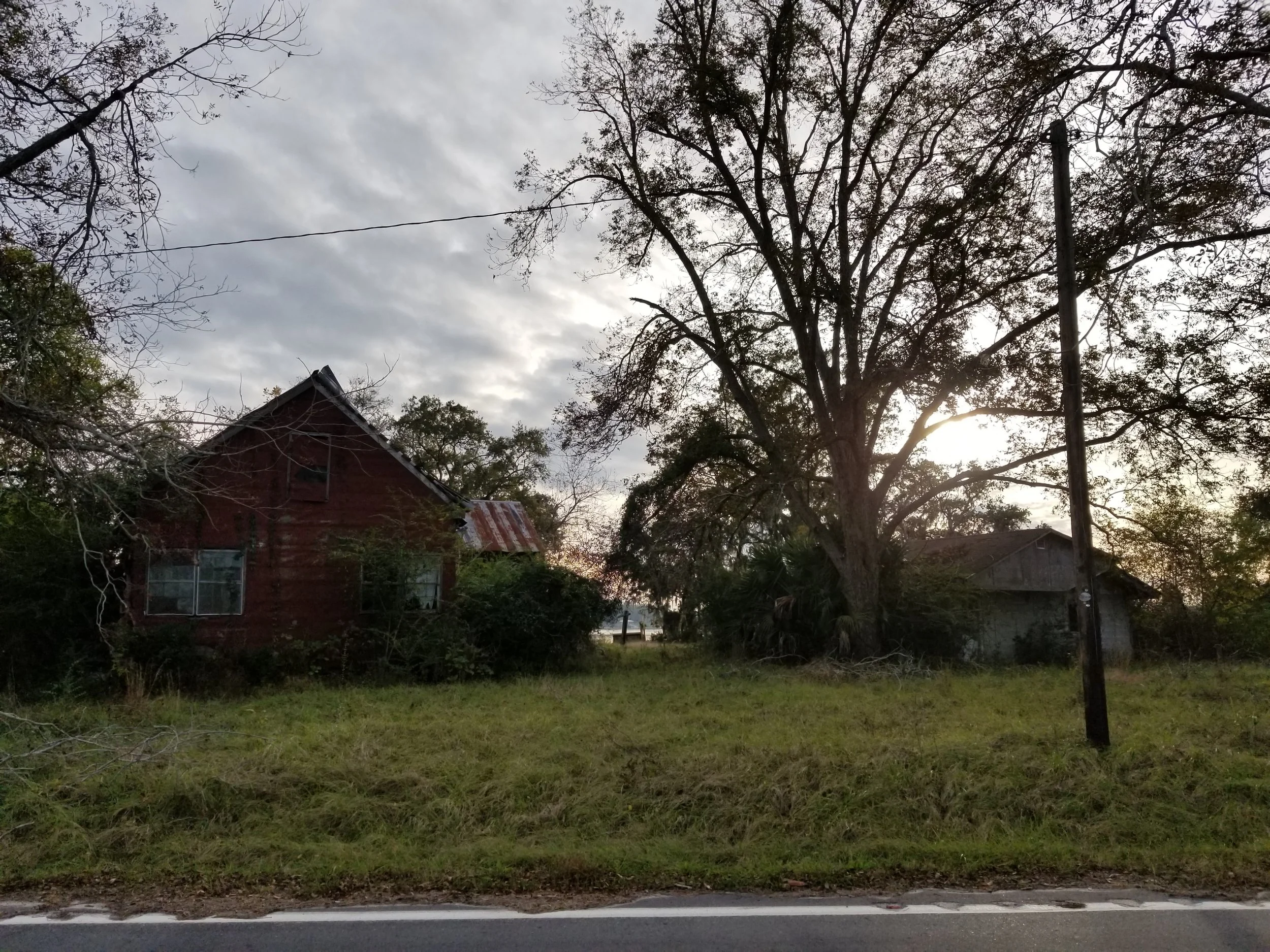 This run-down building was along the road near the boat ramp. I liked the way it looked, especially in the pink late-day sun.