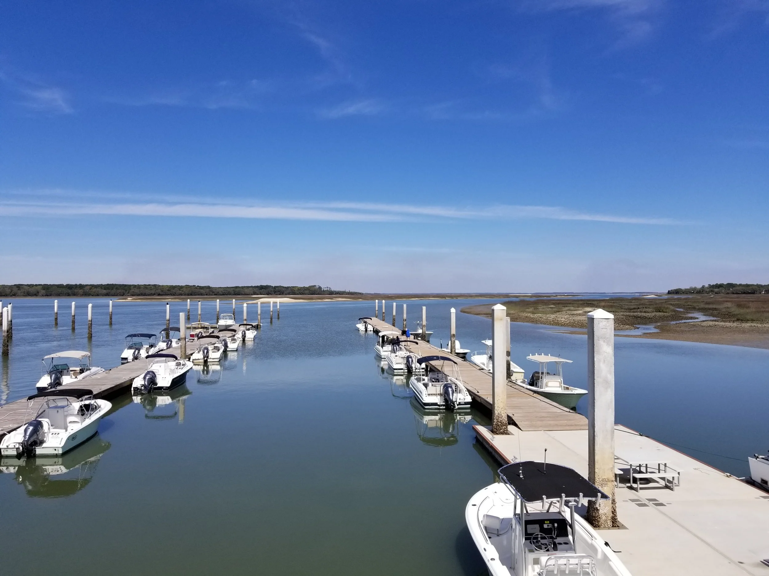 The view from the office porch, overlooking the Freedom Boat Club docks toward Port Royal Sound.