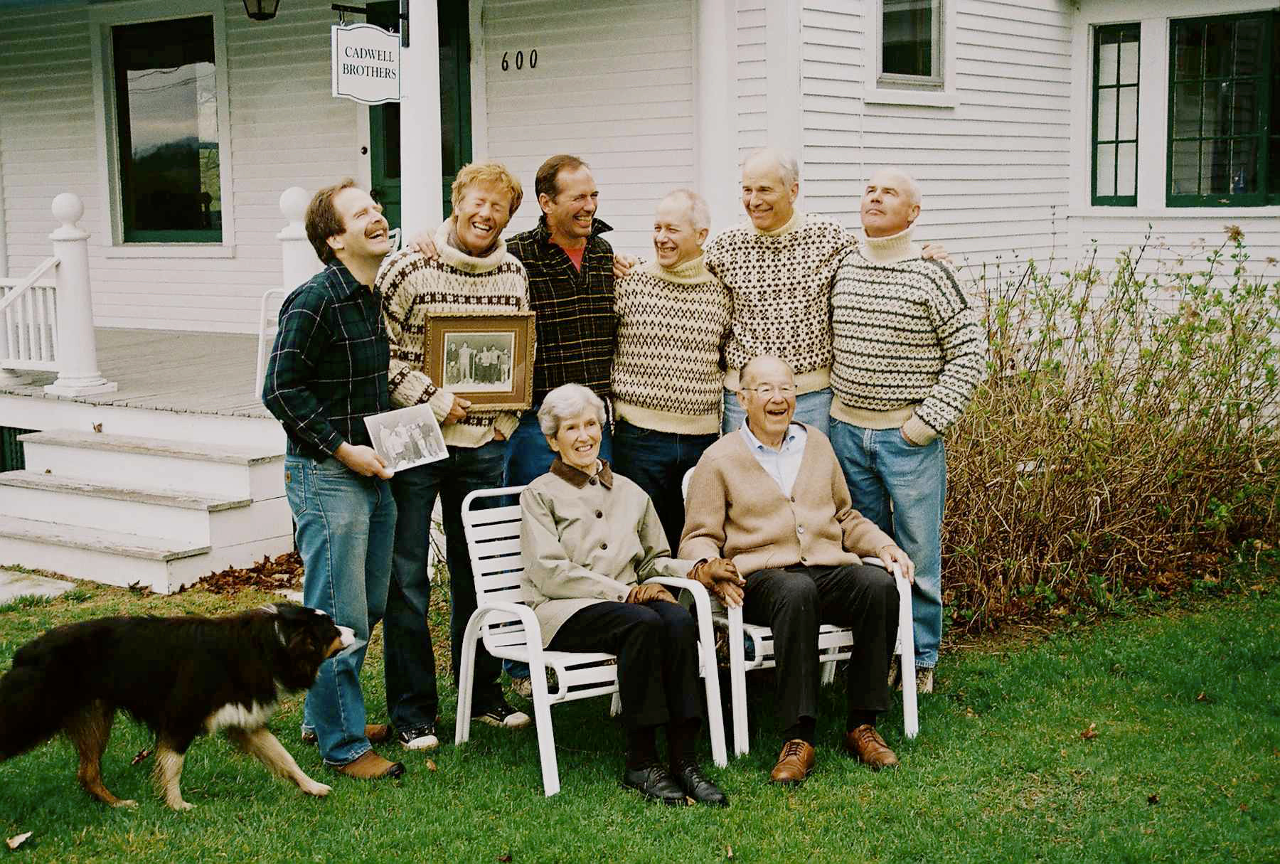 Cadwell Brothers (wearing sweaters and shirts made by their mother), with their Parents, circa 2005