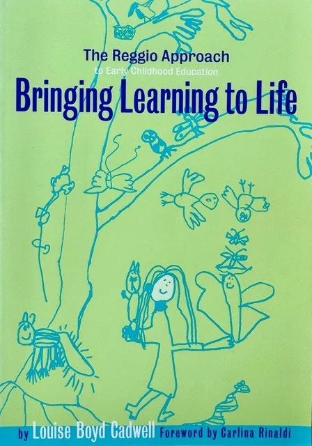 Book cover titled 'Bringing Learning to Life' by Louise Boyd Cadwell with a foreword by Carlina Rinaldi, featuring a simple, blue line drawing of a girl and various animals and insects climbing on and around a tree on a green background.
