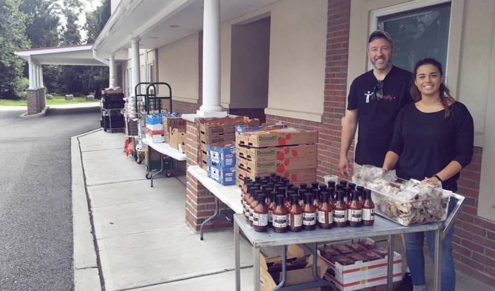 Daddy Matty's donating meals and sauce at the Interfaith Food Pantry of Morris County