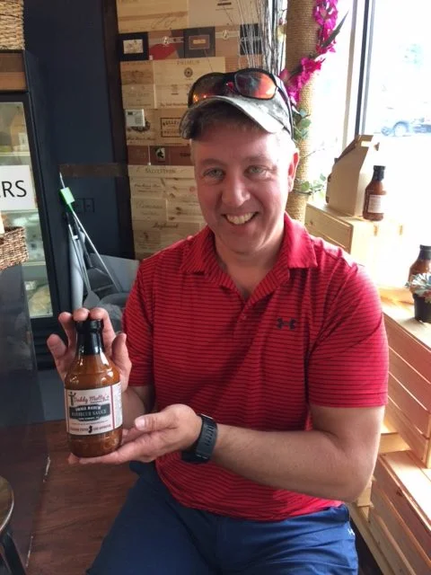 Daddy Matty! Matt James with his signature BBQ sauce.