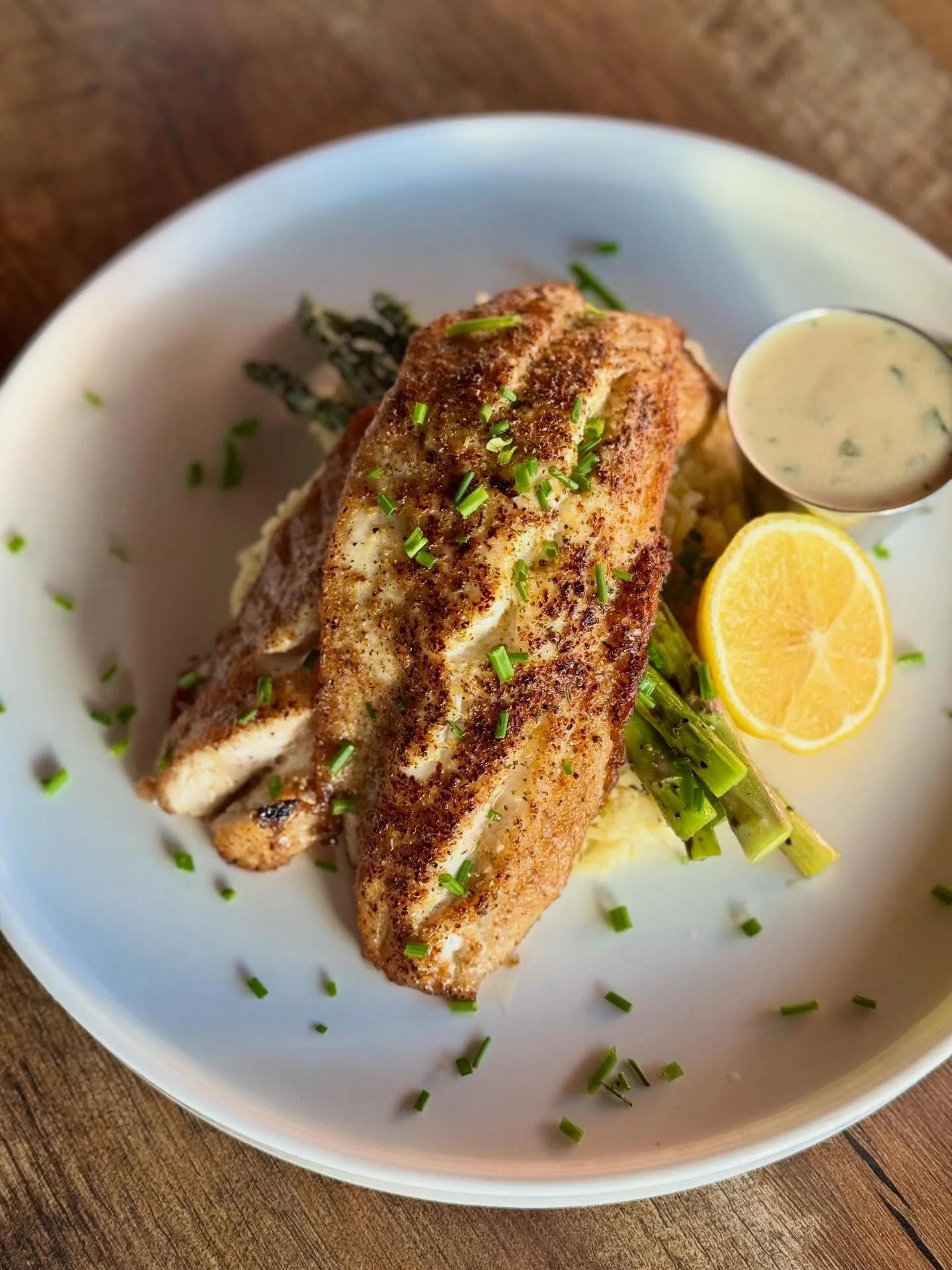 Striped Sea Bass accompanied by lemon rice pilaf and grilled asparagus. Happy holidays! 

#stripedseabass #lakehighlands #dallasdining #lheats #whiterocklake
