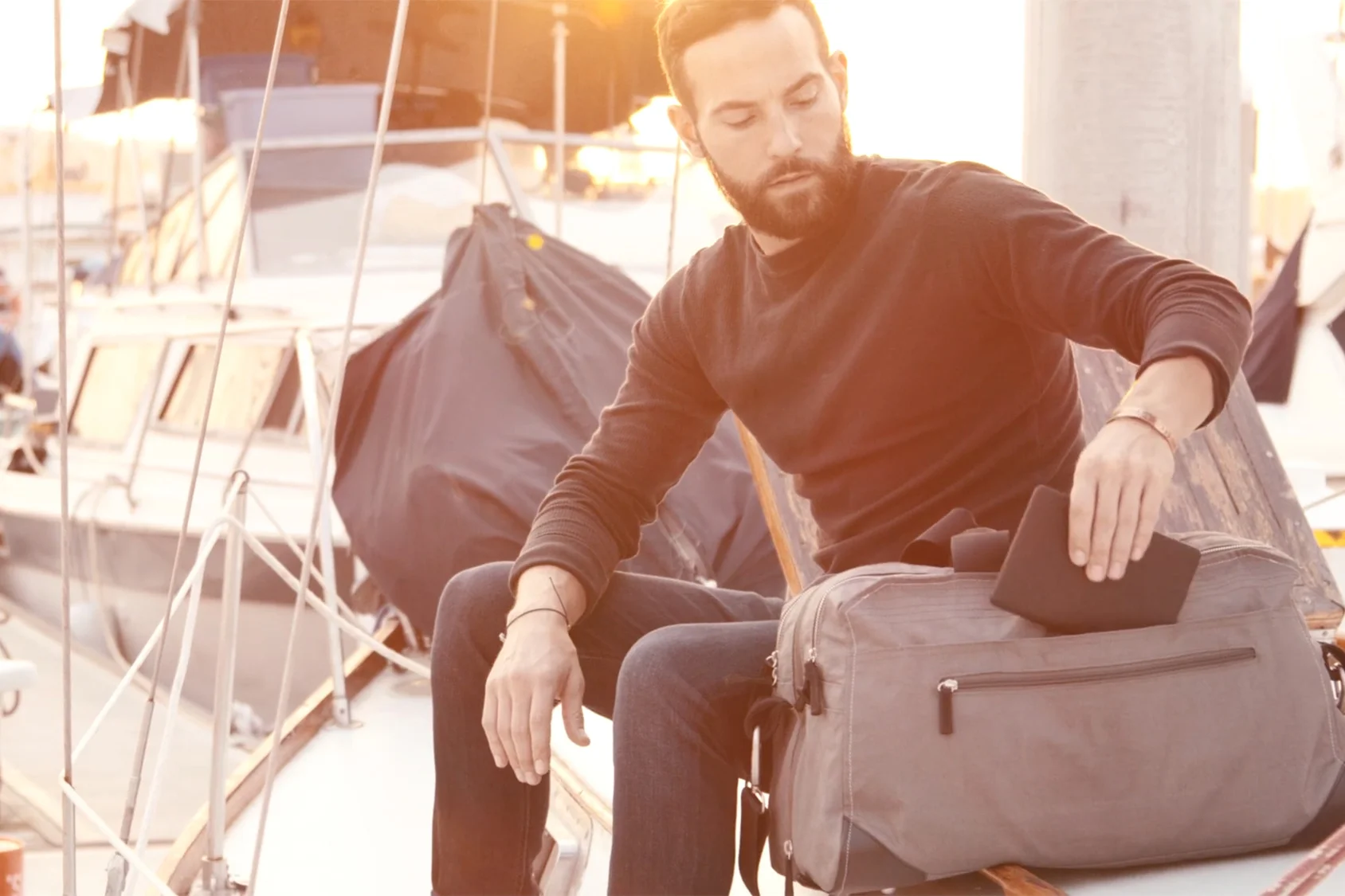 Pakt_PRESS_Pakt One Grey on a boat 2.jpg