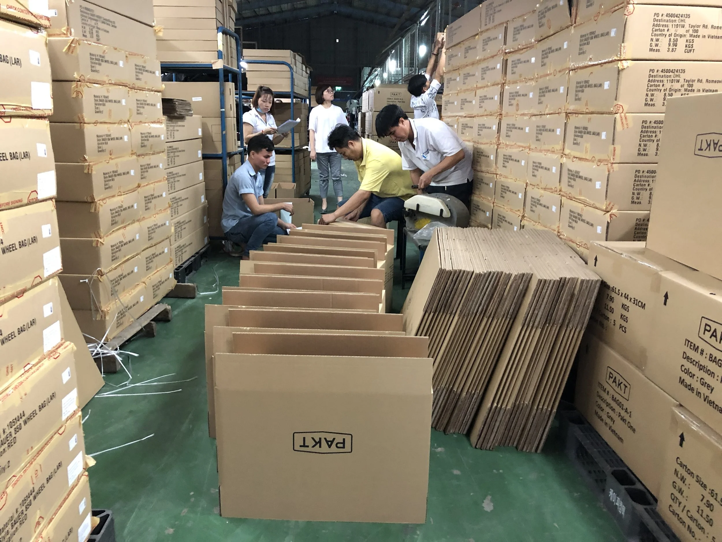 Tons of Pakt One bags in their SeaHive boxes.