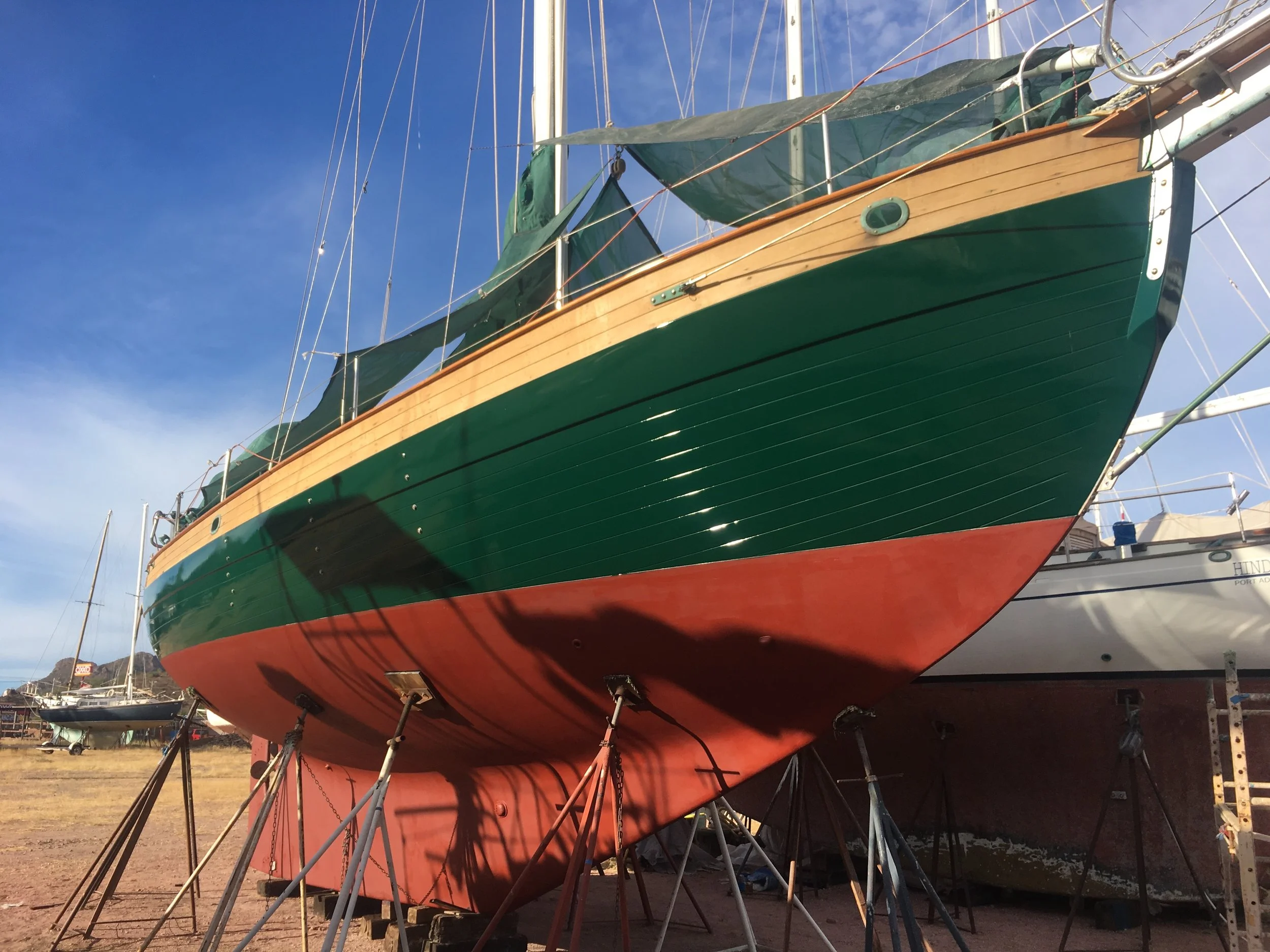 Looks like Christmas! Second coat of bottom paint and the new Awl Grip Jade Mist Green.