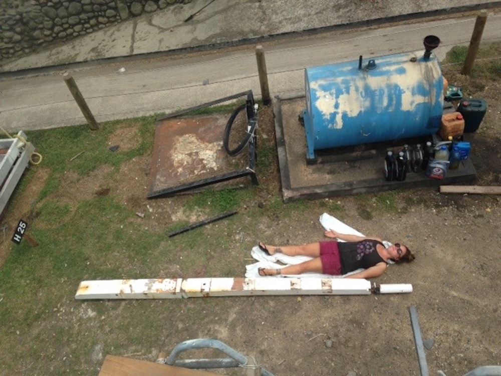 “For scale or for a nap?” Asked Clif’s Dad Rob. Me lying next to the bowsprit after the removal… just to give you an idea of the size of wood we’re dealing with.