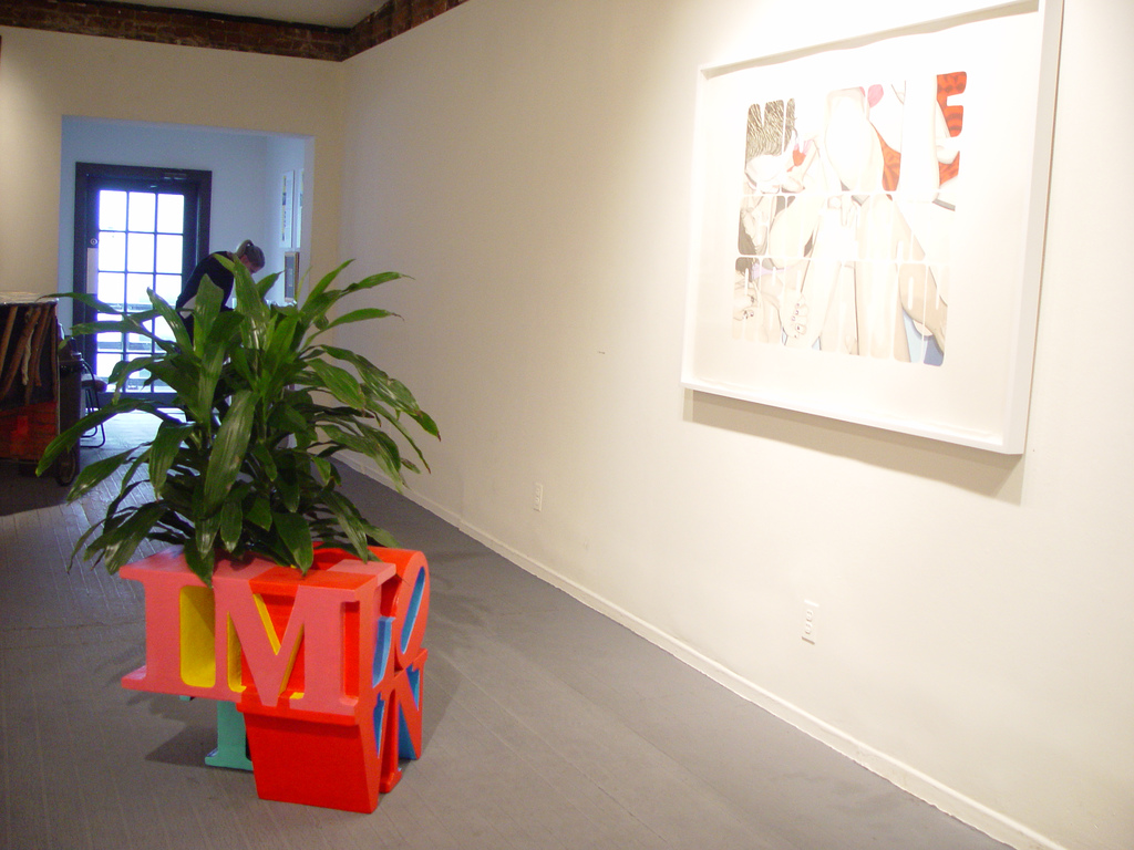 Sloganeers installation shot with Lou Laurita painting and Evander Greenfield sculpture.