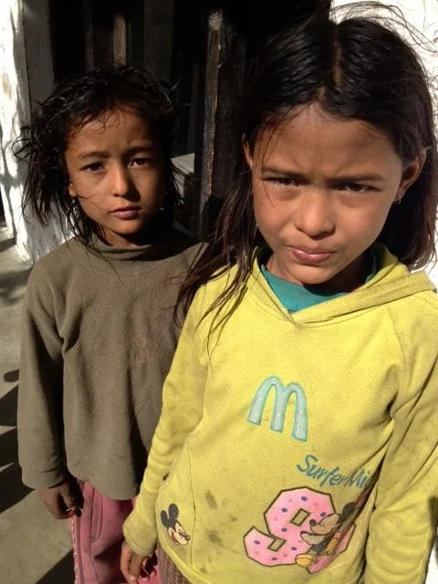 Two young visitors to Kagbeni clinic