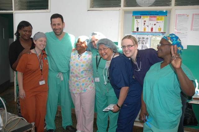 OR team waiting to operate and 12 yr old boy- cleft lip